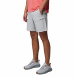 a man wearing PFG Terminal Tackle III Shorts