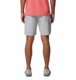 a man wearing PFG Terminal Tackle III Shorts