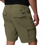 a man wearing green ROC Tech Cargo Shorts