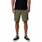 a man wearing green ROC Tech Cargo Shorts