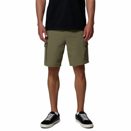 a man wearing green ROC Tech Cargo Shorts