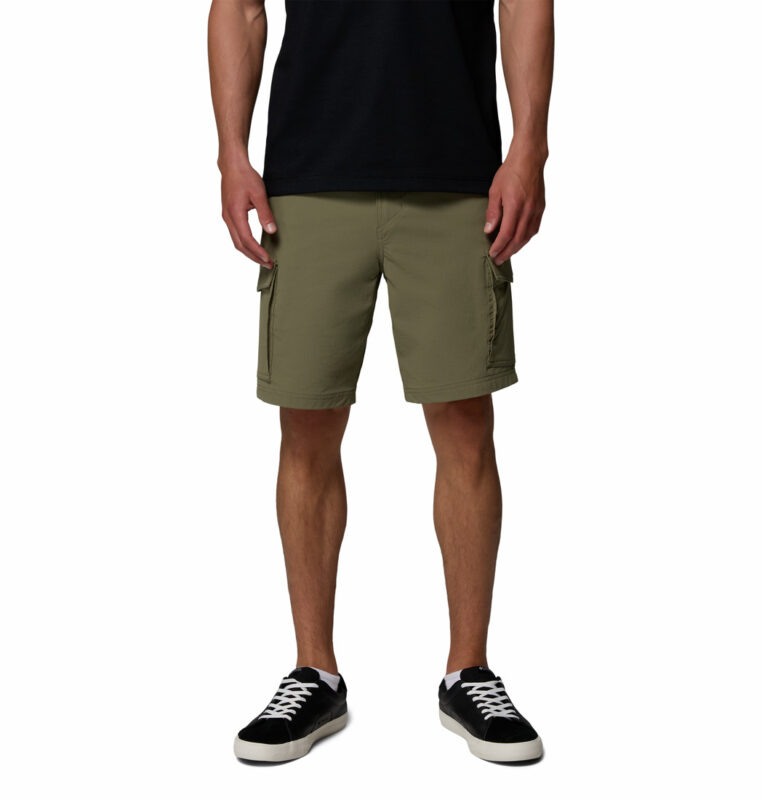 a man wearing green ROC Tech Cargo Shorts