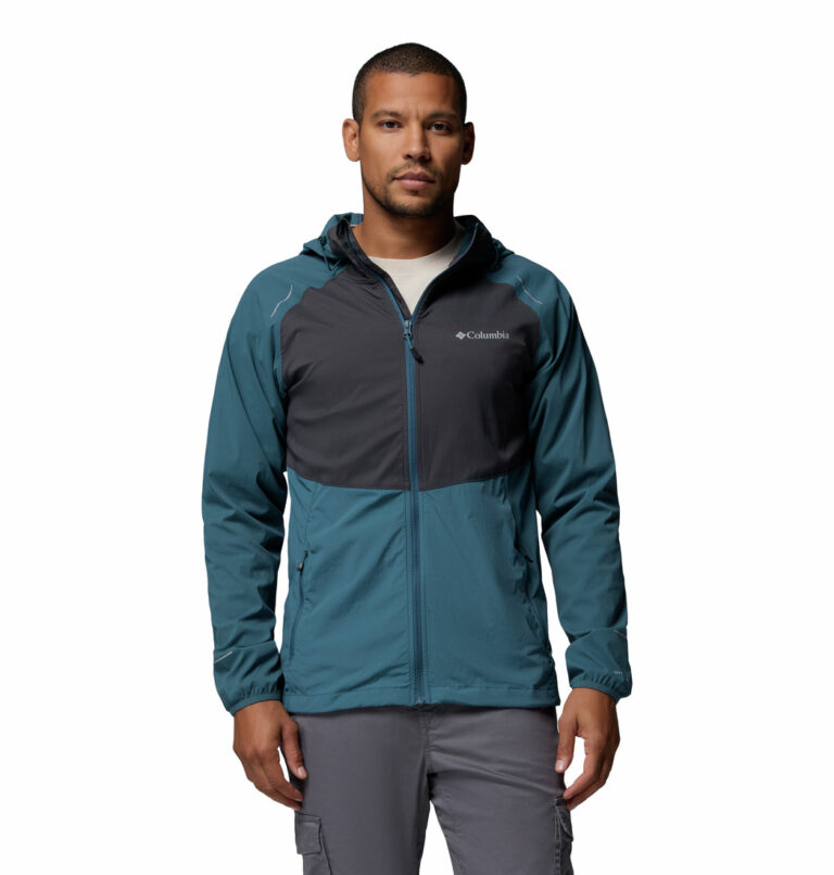 a man wearing a blue Columbia Tech II Windbreaker