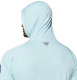 a man wearing a blue PFG Terminal Tackle Hoodie
