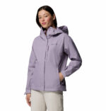 a women wearing a purple Hikebound II Jacket