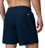 a man wearing a PFG Rambler Water Shorts