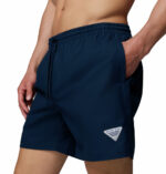 a man wearing a PFG Rambler Water Shorts