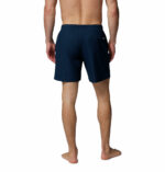 a man wearing a PFG Rambler Water Shorts