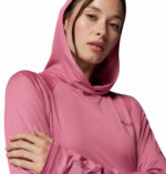 a women wearing a PFG Tidal Tee II Hoodie