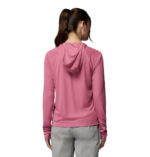 a women wearing a PFG Tidal Tee II Hoodie
