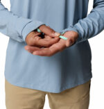 a man wearing a Wild Cast Sun Shirt