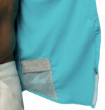 a man wearing a Skiff Guide II Long Sleeve Shirt