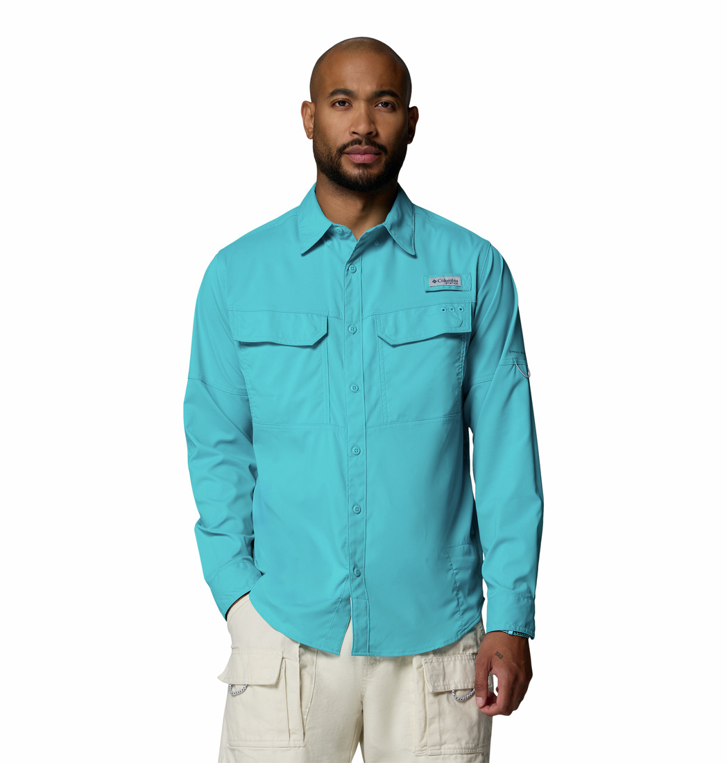 a man wearing a Skiff Guide II Long Sleeve Shirt
