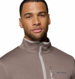 a man wearing a Essential Hike Grid Full Zip Fleece Jacket