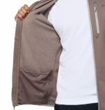a man wearing a Essential Hike Grid Full Zip Fleece Jacket