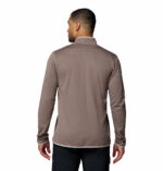 a man wearing a Essential Hike Grid Full Zip Fleece Jacket